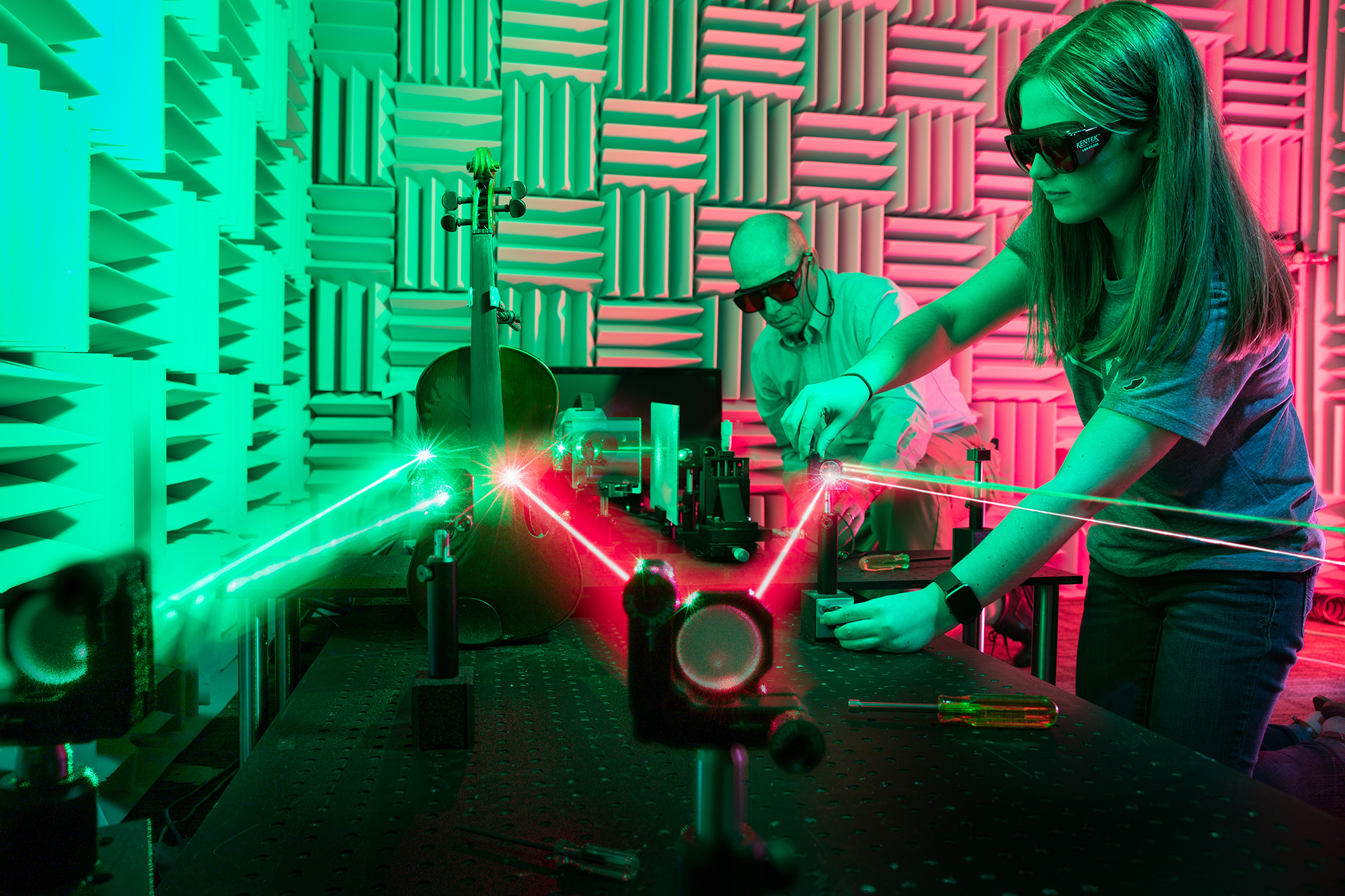 Studying music acoustics using lasers in physics professor Thomas Moore’s anechoic chamber lab.